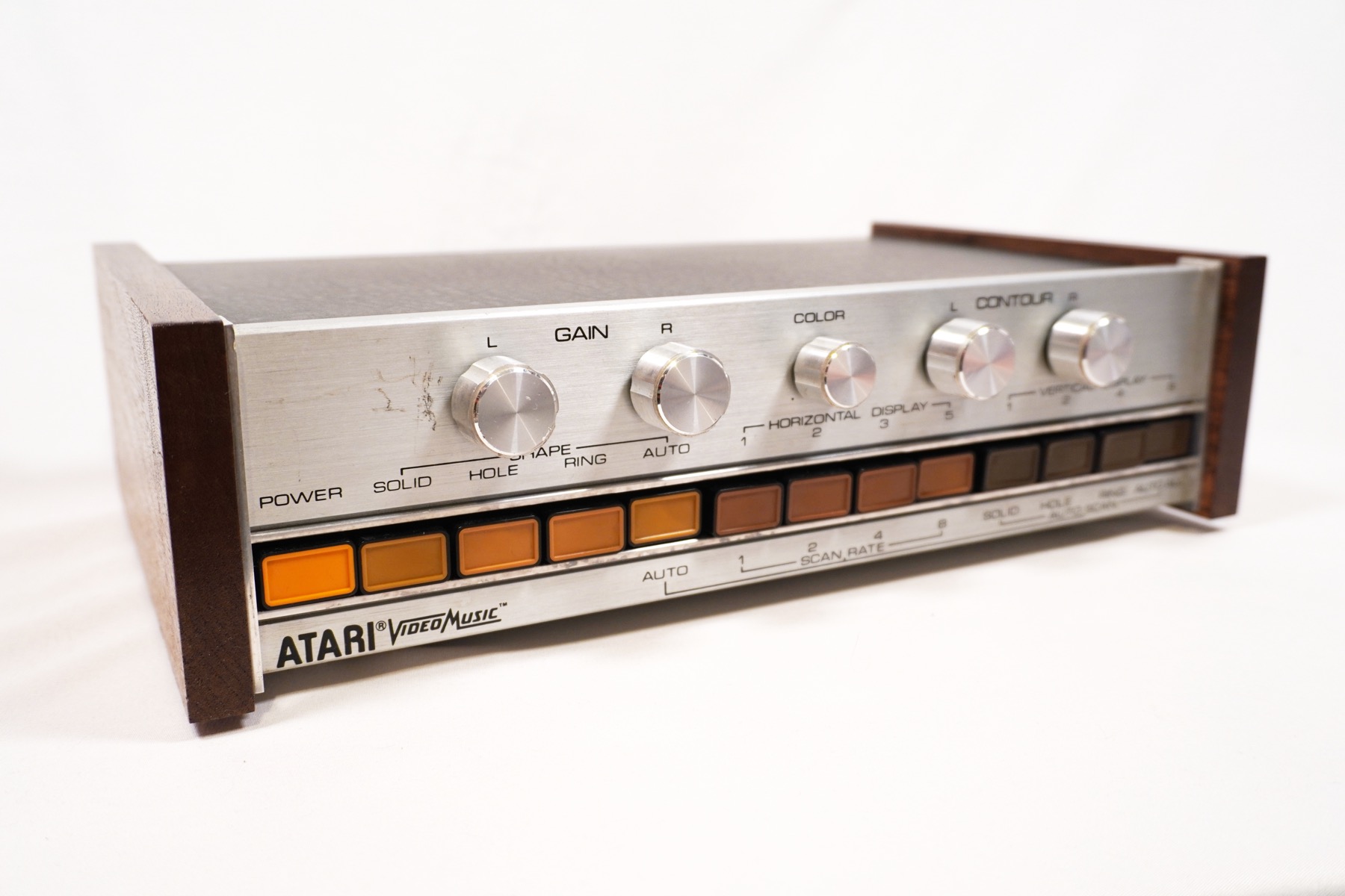 Atari Video Music C-240 console with walnut side panels and brushed aluminum faceplate